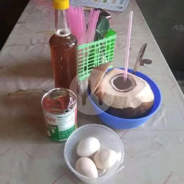 Kelapa Bakar Spesial Telor Ayam Kampung | Kelapa Bakar.nene Siti